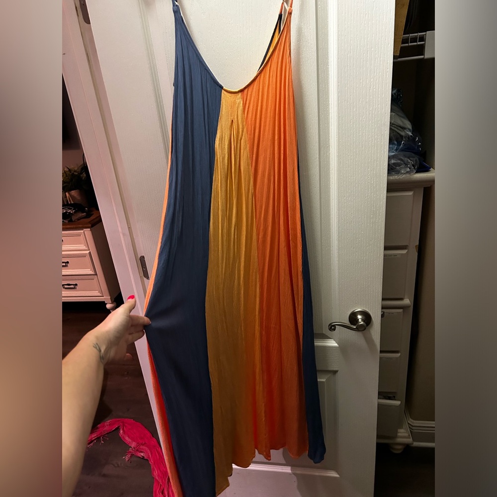 Skye multi colored flowy boho style dress. Backless